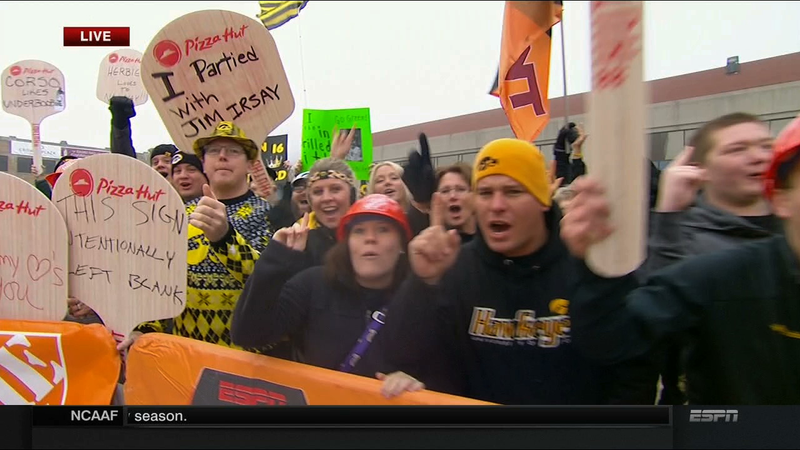 Illustration for article titled Cowherd Hates Santa: Your B1G Championship College GameDay Sign Roundup